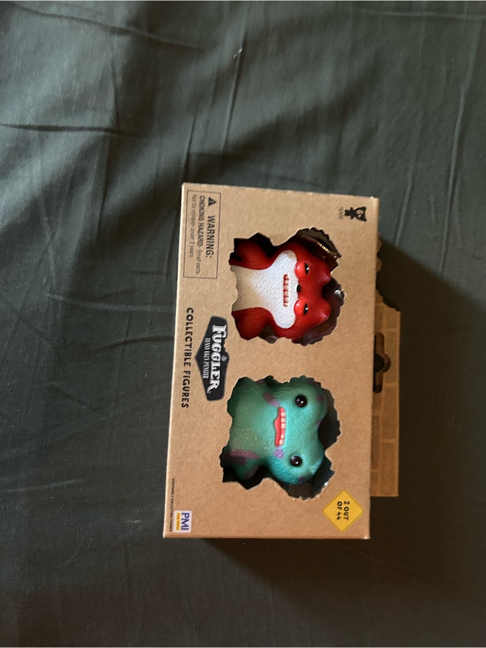 Ruggler Collectible Figures 2-Pack - Red & Green